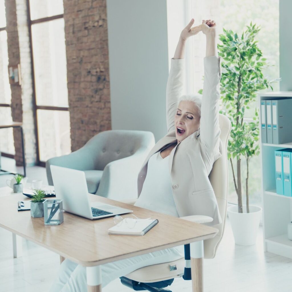 woman yawning at work